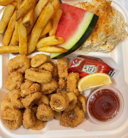 Fried calamari platter with fries and watermelon