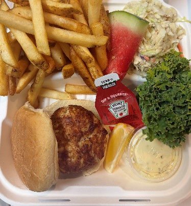 Crab cake sandwich platter with fries